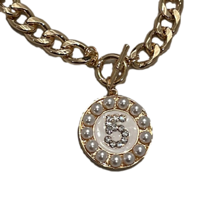 Ch-nel #5 Goldtone and Faux Pearl Toggle Necklace, NWOTs